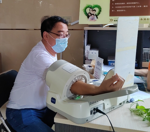 A pastoral worker from Xiapu County, Ningde City, Fujian Province, took a blood pressure measurement during an annual health check-up conducted by Xiapu CC&TSPM for pastoral staff from October 12 to 13, 2022.