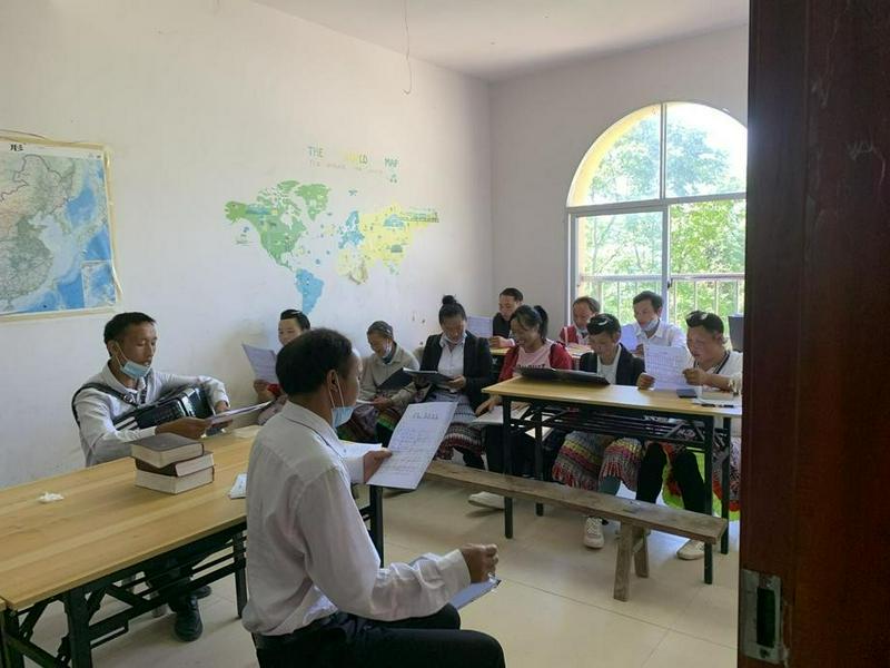 Believers were learning to sing a hymn in the new Liangfeng'ao Church, Zhaotong City, Yunnan Province, at an unknown date.