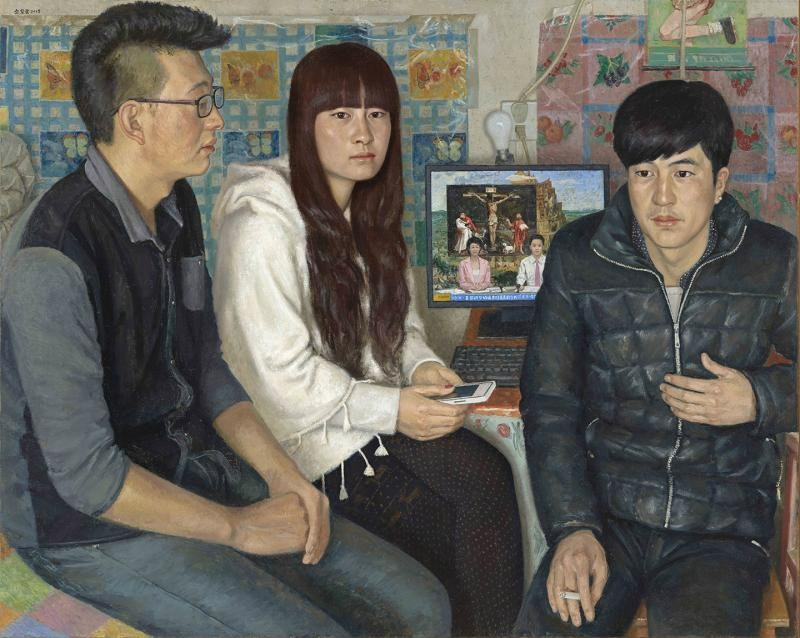 A picture with the name of "News" painted by oil on canvas is displayed during an exhibition hosted from Nov. 4 through to Dec. 12, 2022, in the Metcalf Gallery, Modelle Metcalf Visual Arts Center at Taylor University in Upland, Indiana, US. The picture shows a family with a computer showing news about the crucifixion of Jesus.