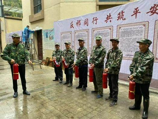 Believers carried fire extinguishers to conduct a fire drill at Jiaojiang Church, in Taizhou, Zhejiang, on November 15, 2022.