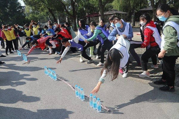 A game that some persons were pulled to touch the water bottles was hosted in Shishan Church, Jiangsu, on November 5, 2022.