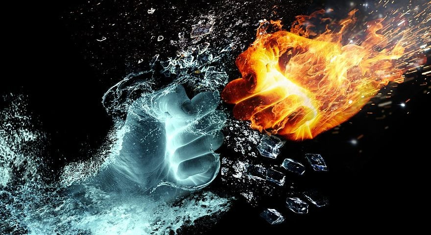A picture shows a hand made of water facing a hand made of fire.
