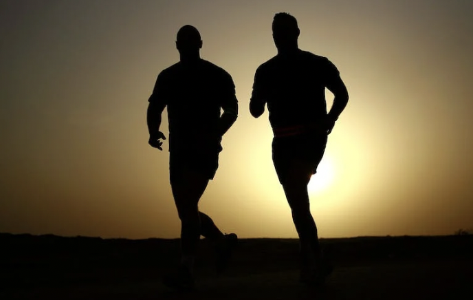 A picture shows two man running.