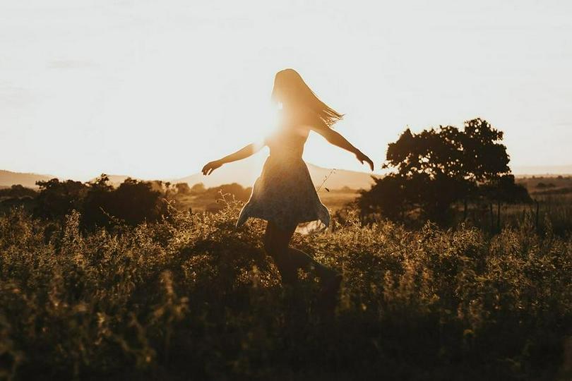 A picture of a girl in the sun