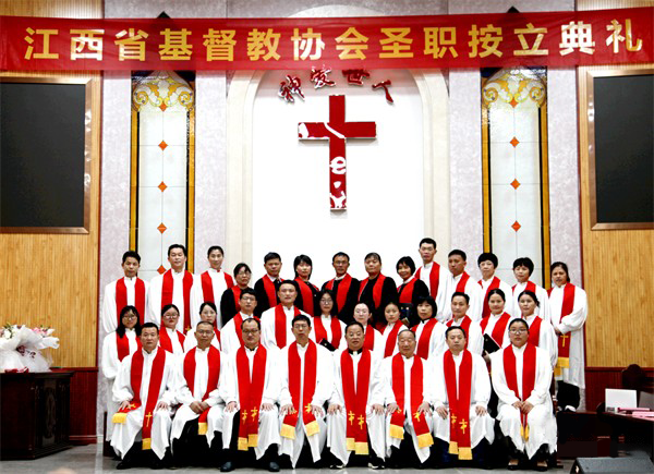 Newly-ordained clerics and other pastors took a group picture after an ordination service in Shangrao City, Jiangxi Province, on April 16, 2023.