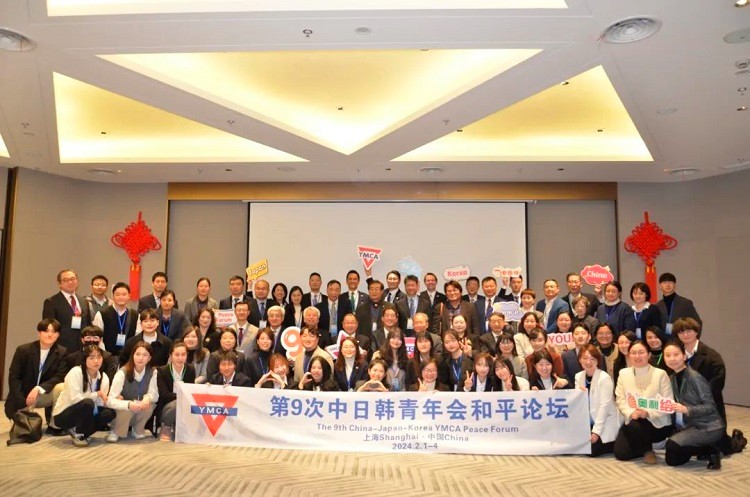 Senior and youth representatives from the Chinese, Japanese, and Korean YMCAs took a group picture during the ninth China-Japan-Korea YMCA Peace Forum hosted in Shanghai from February 1 to 4, 2024.